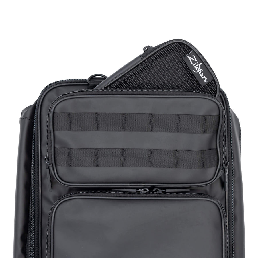 Small Black Zildjian Accessory Pouch poking out of the top pocket of Zildjian Touring Stick Bag