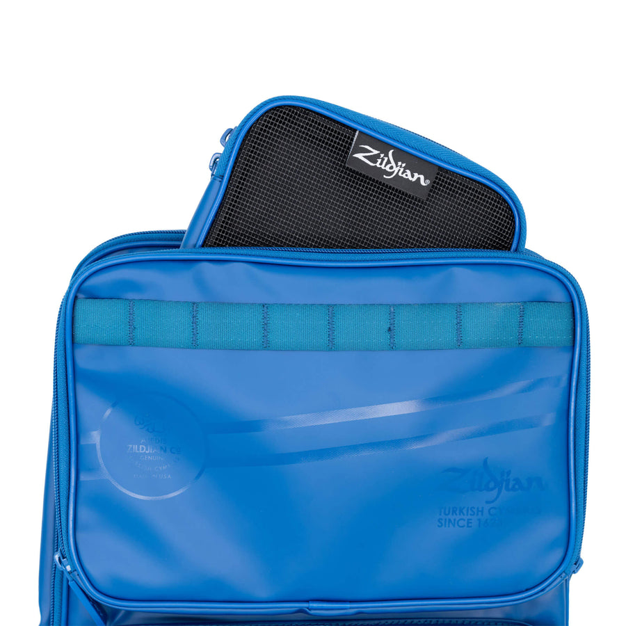 Large Blue Zildjian Accessory Pouch poking out of the top pocket of Zildjian Touring Backpack