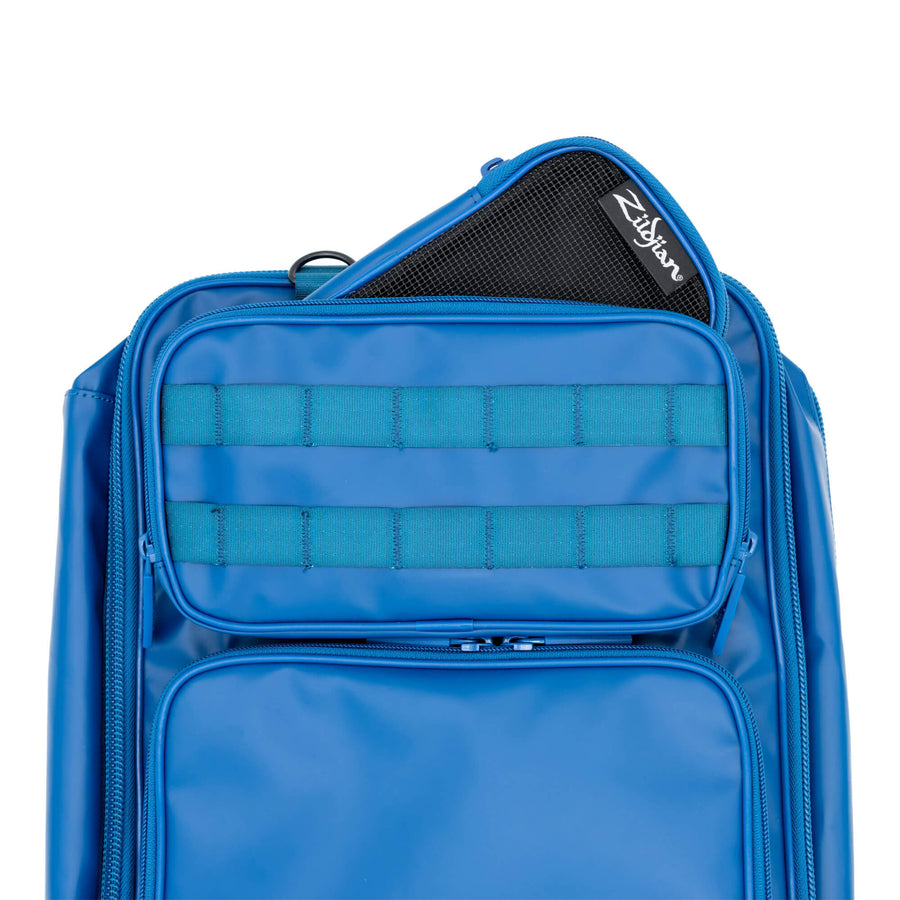Small Blue Zildjian Accessory Pouch poking out of the top pocket of Zildjian Touring Stick Bag