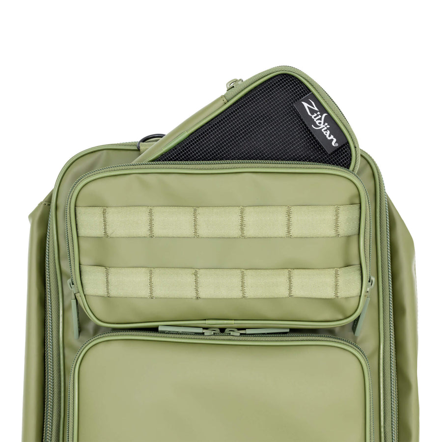 Small Green Zildjian Accessory Pouch poking out of the top pocket of Zildjian Touring Stick Bag