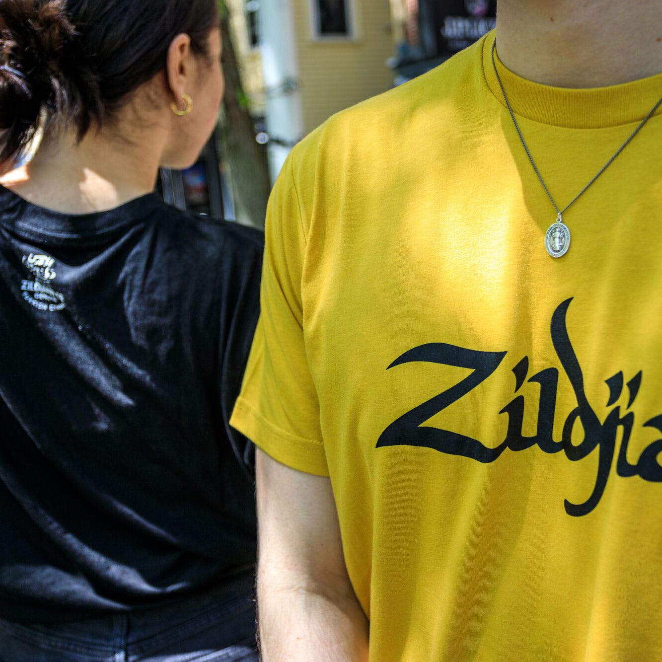 Black and gold Zildjian logo tee pose